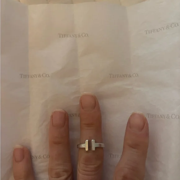 Tiffany & Co. Silver T Design Ring Sz 7
Via - Picture 6 of 10